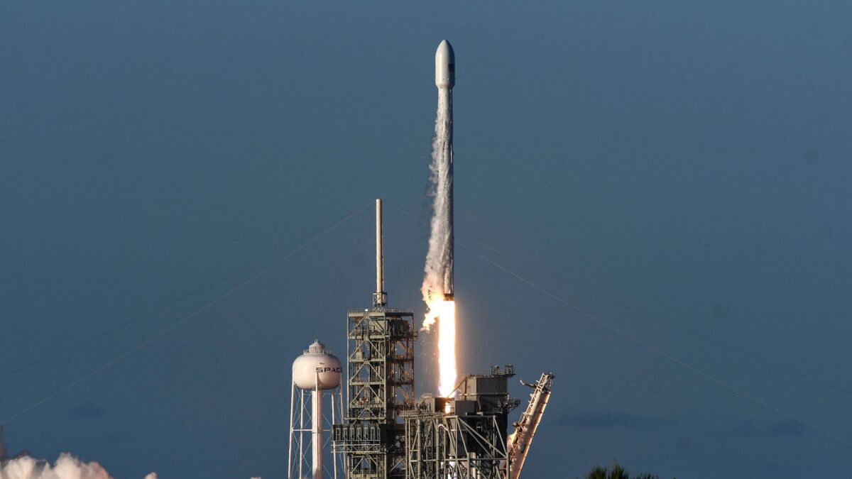 A SpaceX Falcon 9 rocket lifts off from Kennedy Space Center in Cape Canaveral, Fla., on July 5.