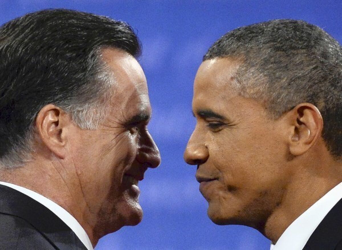 October 22, 2012. President Obama greets Republican presidential candidate Mitt Romney, left, following the third and final presidential debate at Lynn University in Boca, Raton, Fla.