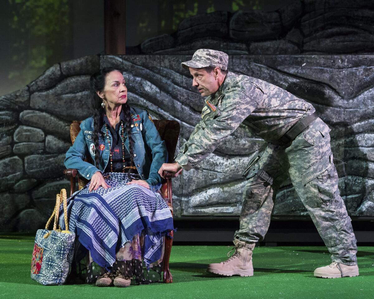 Tribal elder Aunt Bev (LaVonne Rae Andrews) refuses to give up any ground to National Guard Capt. Hewitt (Matt Kirkwood) during a land rights protest in Vickie Ramirez's world-premiere play "Stand-Off at Hwy #37" at the Autry National Center.