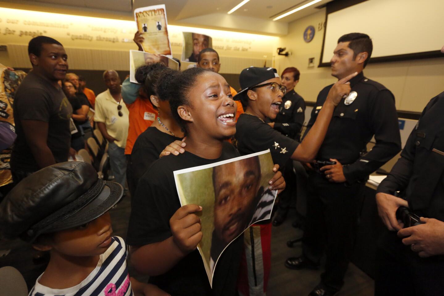 Protesters disrupt the Los Angeles Police Commission.