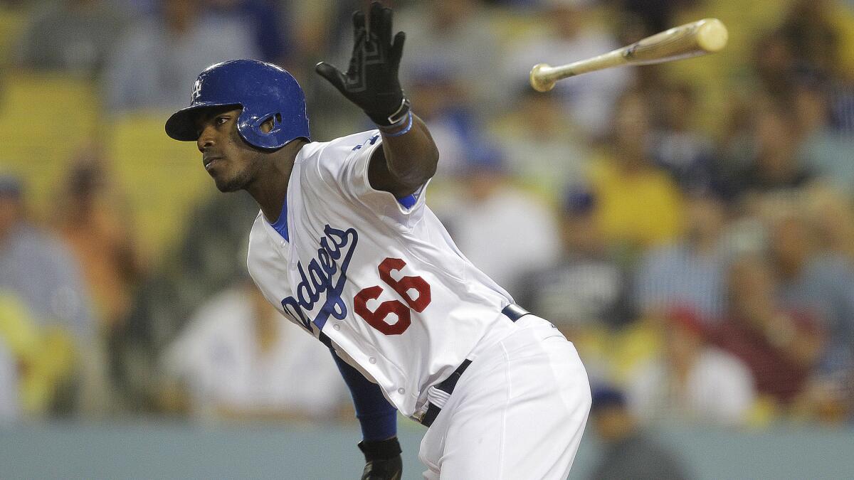 Dodgers center fielder tosses his bat as he pops out on the first pitch of the game Wednesday during a 4-0 win over the San Diego Padres.