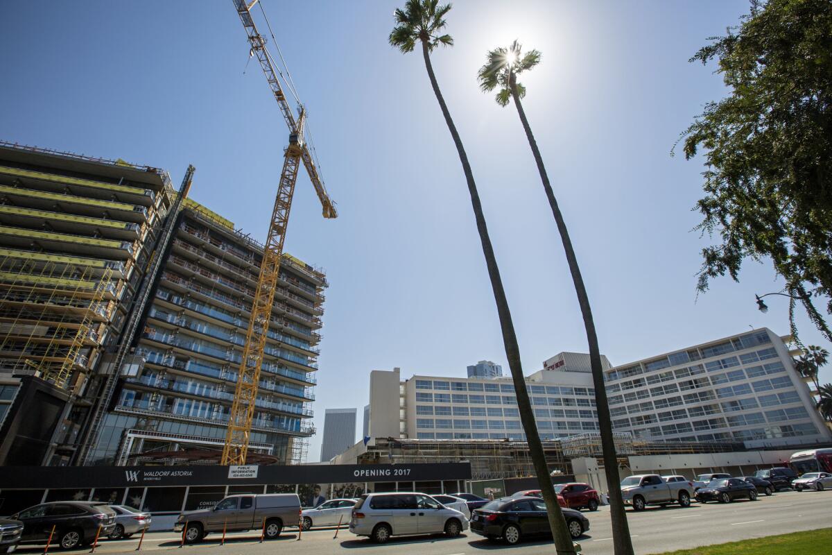 Ongoing construction in Beverly Hills. Plans to erect the city's tallest building ever have pitted two deep-pocketed developers against each other.