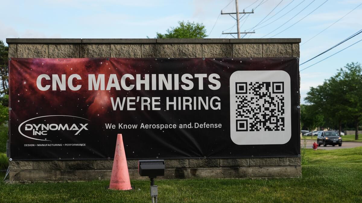 Filings for unemployment benefits fall to 226,000 last week as layoffs remain historically low