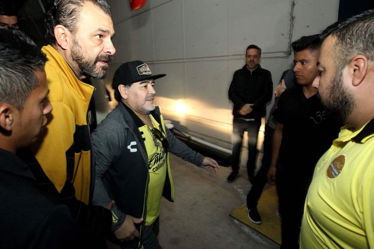 The coach of Mexican second division football team Dorados, Argentine Diego Armando Maradona, arrives for the second leg match of the final against Atletico San Luis, at the Alfonso Lastras Ramirez stadium in San Luis Potosi, Mexico, on December 2, 2018.