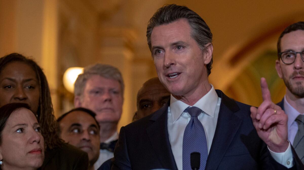 Gov. Gavin Newsom announces on March 13 that he signed a moratorium on California's death penalty at the state Capitol in Sacramento.