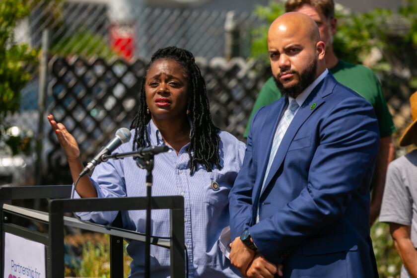 Los Angeles, CA - July 07: Senator Lola Smallwood-Cuevas and Assembly member Isaac Bryan answer questions at press conference held by Partnership for Growth LA announcing a groundbreaking new urban farming initiative aimed at addressing food instability and economic inequality throughout parts of South and West LA on Friday, July 7, 2023 in Los Angeles, CA. (Jason Armond / Los Angeles Times)