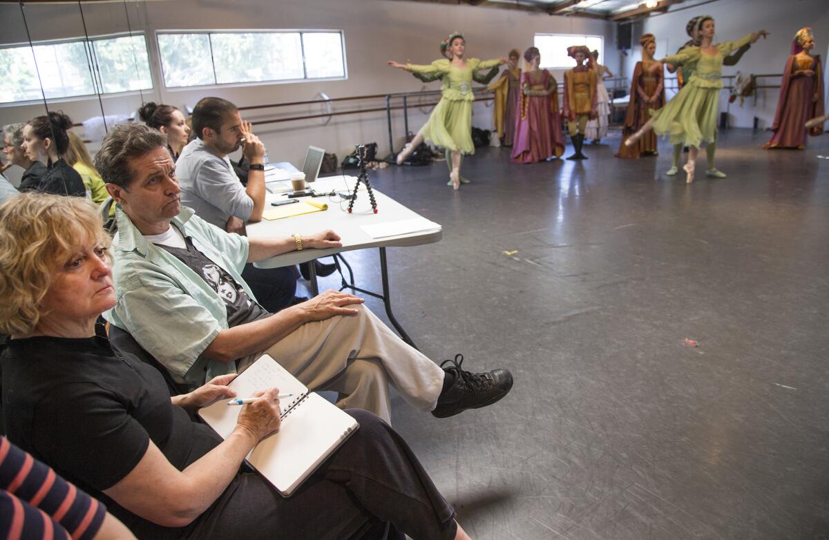 Watching a rehearsal of "Romeo and Juliet" are director Peter Schaufuss, middle, assisted by Marilyn Vella-Gatt, left.
