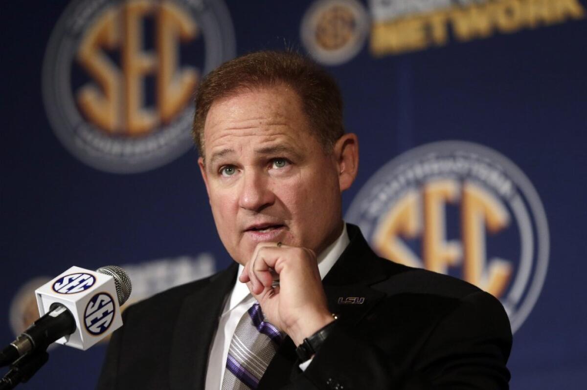 Les Miles, seen here in July, said Wednesday of the Sports Illustrated report alleging improprieties at Oklahoma State during his tenure there that he objected that "somebody would characterize the program that was run there as anything but right and correct."