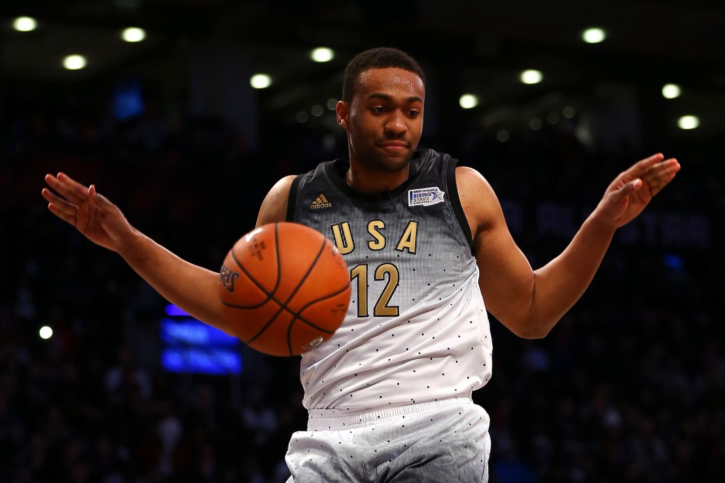 Bucks forward Jabari Parker of the U.S. team after finishing off a dunk against the World team in the Rising Stars Challenge.