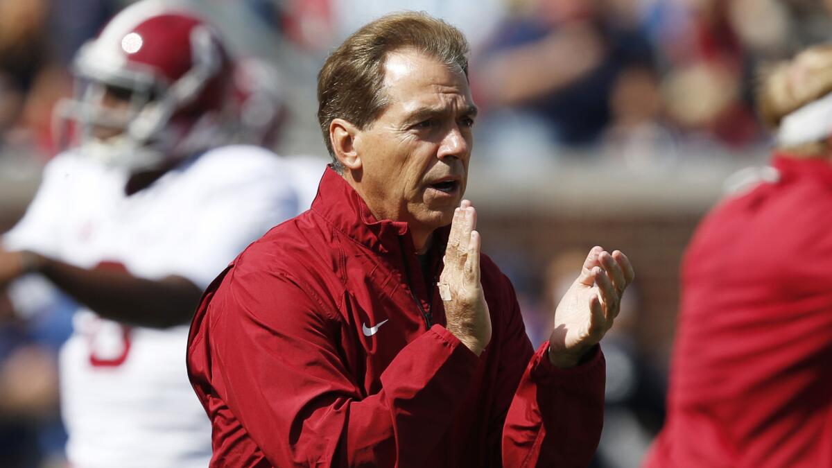 Alabama Coach Nick Saban claps during warmups before the Crimson Tide's loss to Mississippi on Oct. 4.