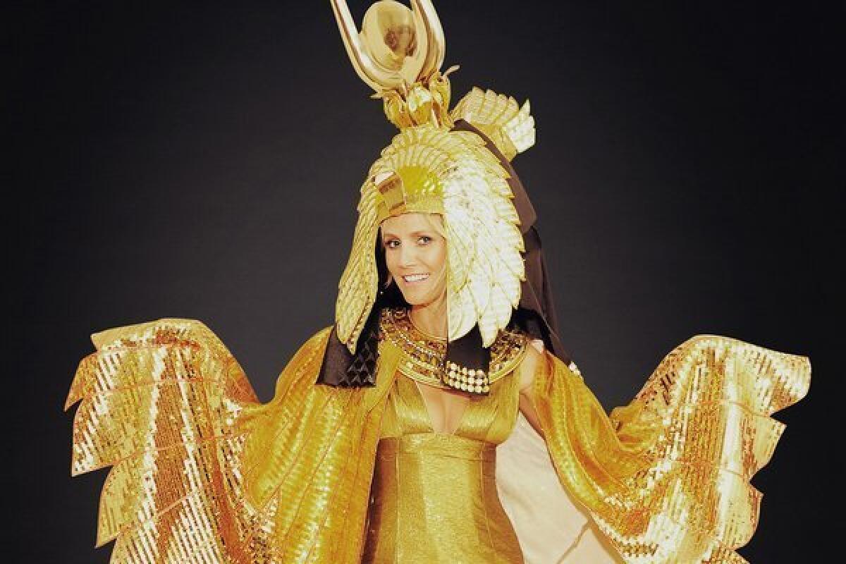 Heidi Klum was going to show as Cleopatra to her 13th annual Halloween party, but she's postponed the shindig because of super storm Sandy.