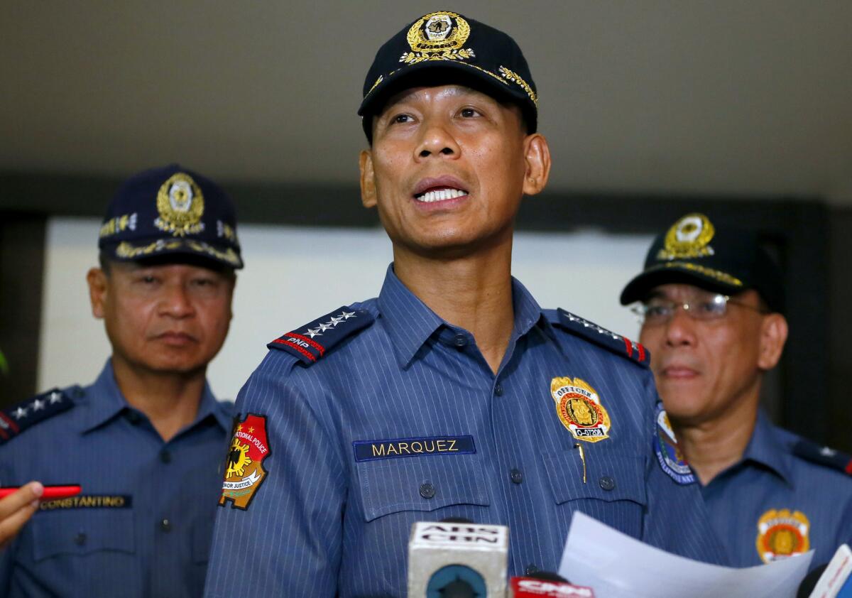 Philippine National Police Director Gen. Ricardo Marquez reads the joint statement of the military and police on the beheading of Canadian hostage John Ridsdel by the extremist group Abu Sayyaf.