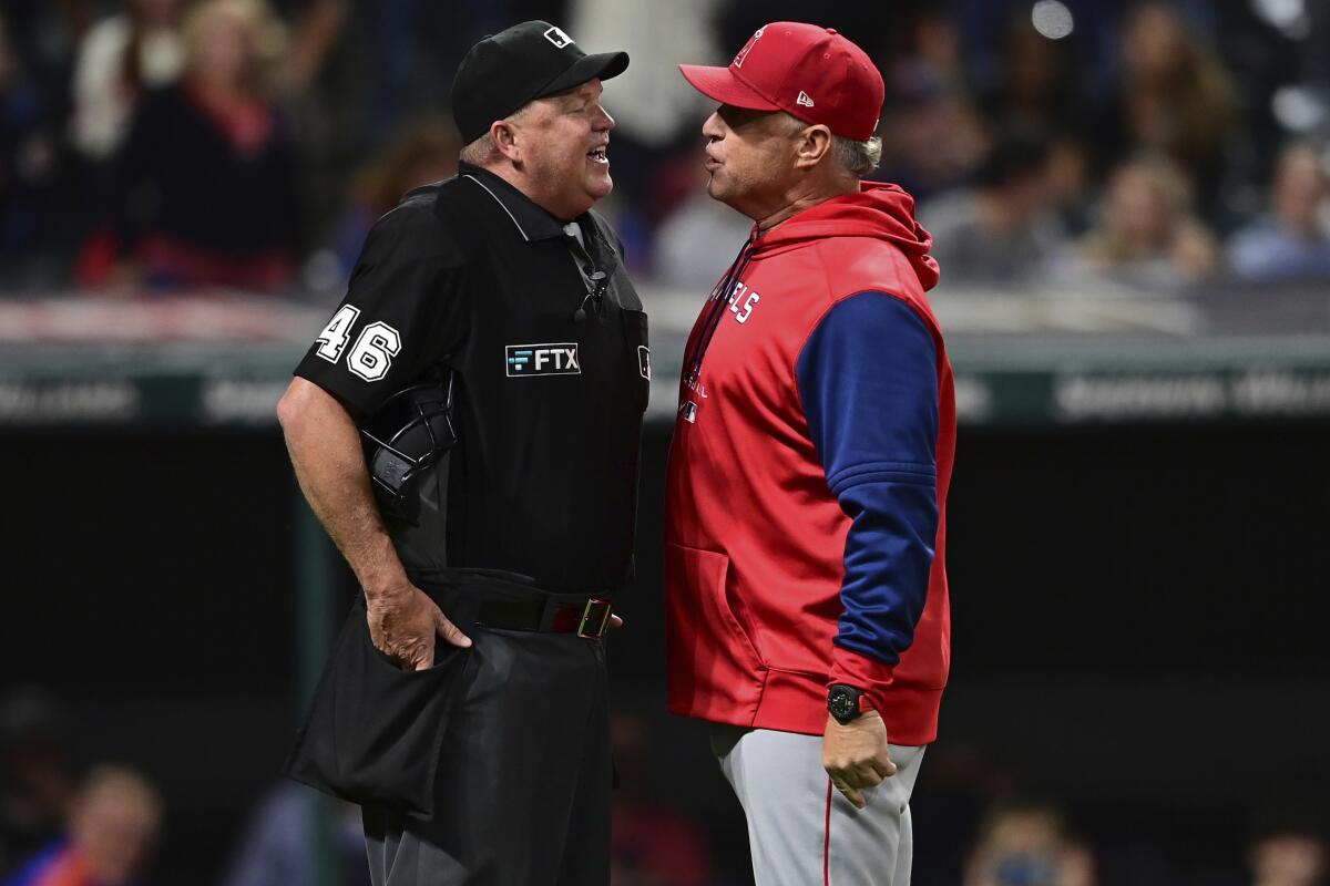 Angels interim manager Phil Nevin argues with home plate umpire Ron Kulpa after being ejected.