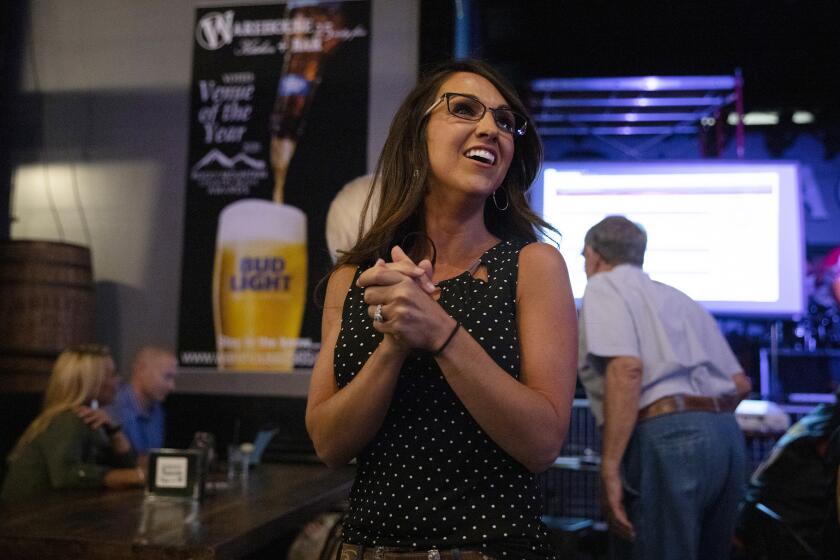 Lauren Boebert waits for returns during a watch party in Grand Junction, Colo., Tuesday, June 30, 2020. Boebert defeated five-term Rep. Scott Tipton in the Republican primary in the 3rd Congressional District. (McKenzie Lange/The Grand Junction Daily Sentinel via AP)