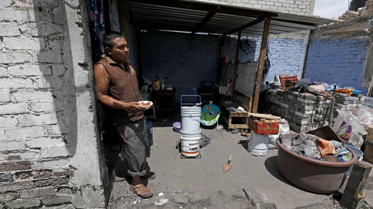 Paul Cordero Eugenio, 26, at his home where two rooms collapsed during the earthquake in Xochimilco.