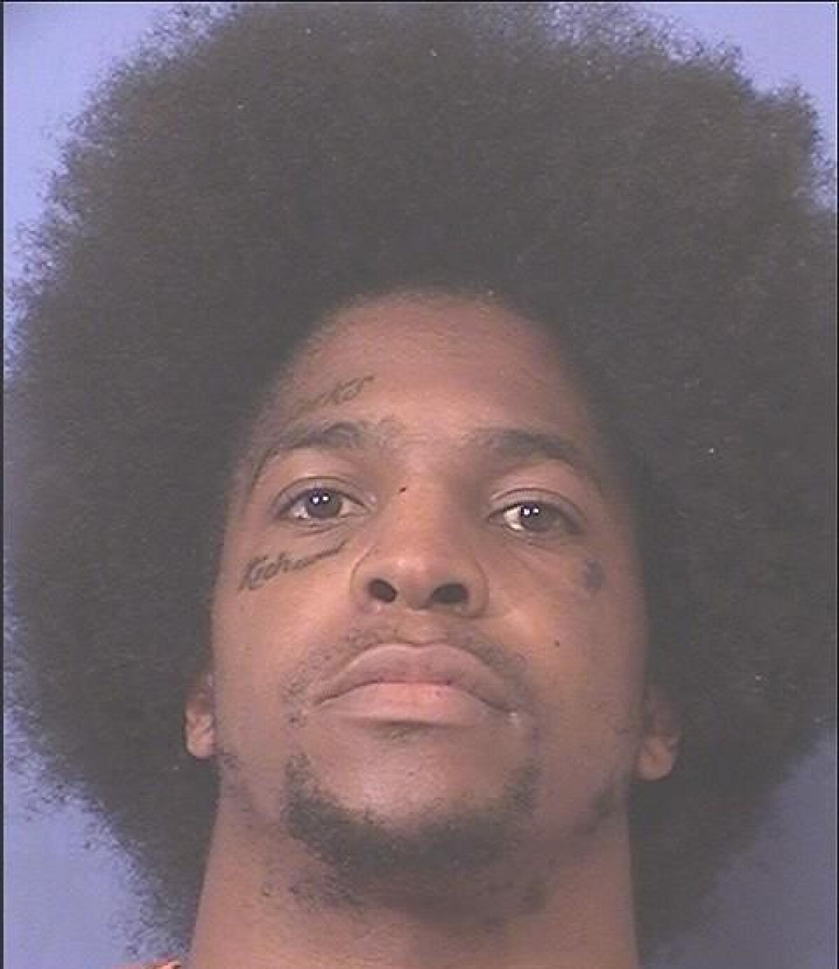 Titus Young is shown in a 2017 mugshot.