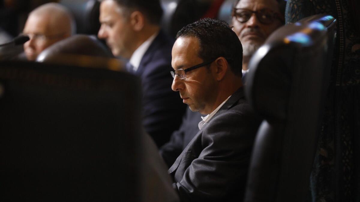 Los Angeles City Councilman Mitchell Englander sits in council chambers at City Hall in early December, a few weeks before his departure from the council.