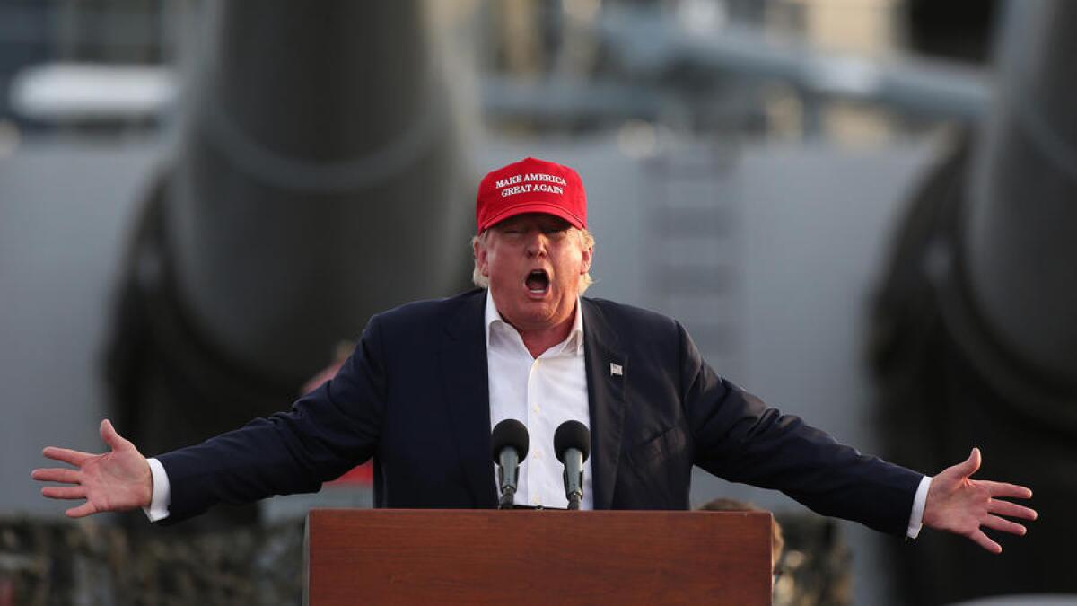 Republican presidential candidate Donald Trump speaks aboard the battleship Iowa in Los Angeles Harbor at an event sponsored by Veterans for a Strong America.