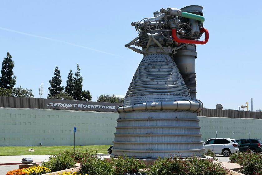 A model of the rocket engine used in the Saturn V rocket sits in front of the entrance to the Aerojet Rocketdyne facility in Canoga Park on May 28, 2015.