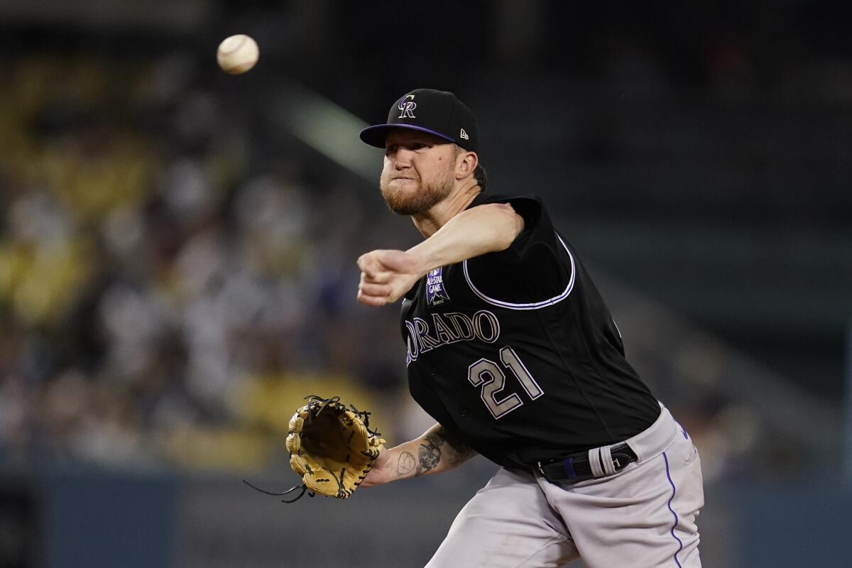 Rockies starting pitcher Kyle Freeland throws to a Dodgers batter during the sixth inning Aug. 27, 2021.