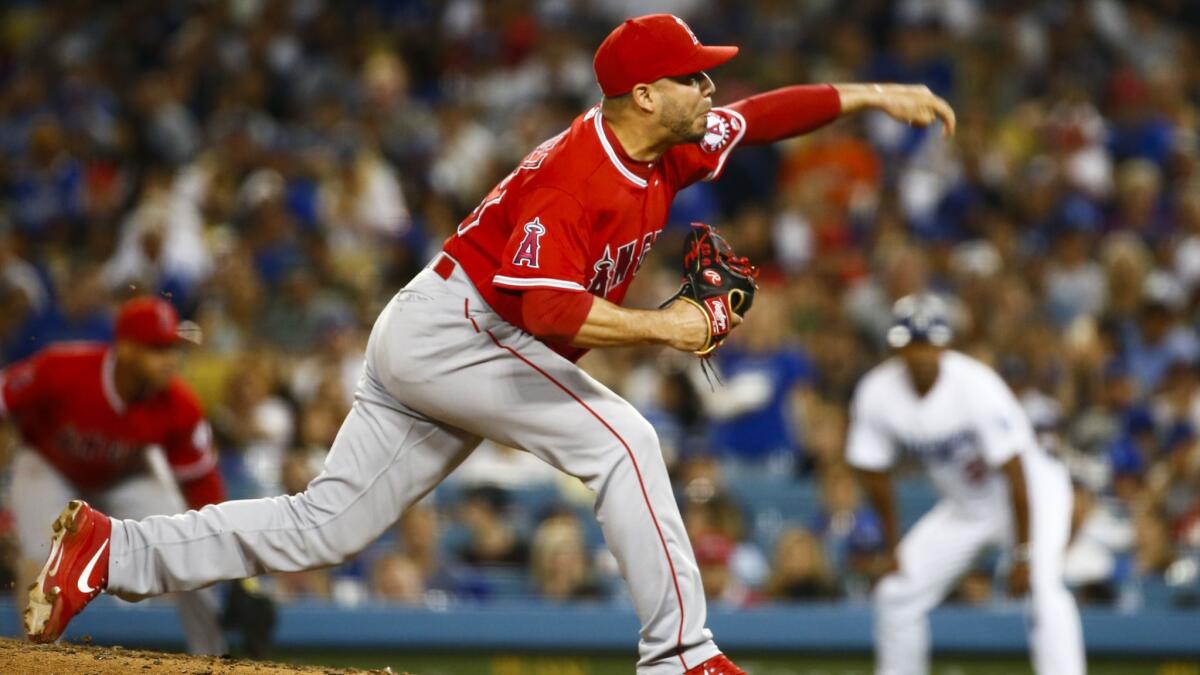 Angels relief pitcher Hansel Robles pitches against the Dodgers during a game at Dodger Stadium on July 13.