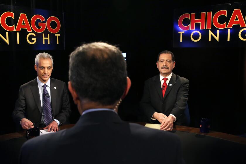 Chicago Mayor Rahm Emanuel, left, and challenger Cook County Commissioner Jesus "Chuy" Garcia during the March 31 televised mayoral debate, the last one ahead of Tuesday's runoff election.