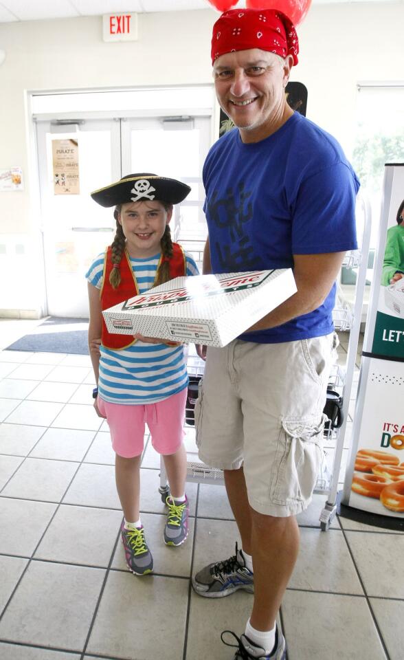 Photo Gallery: Dress Like A Pirate Day at Krispy Kreme Doughnuts