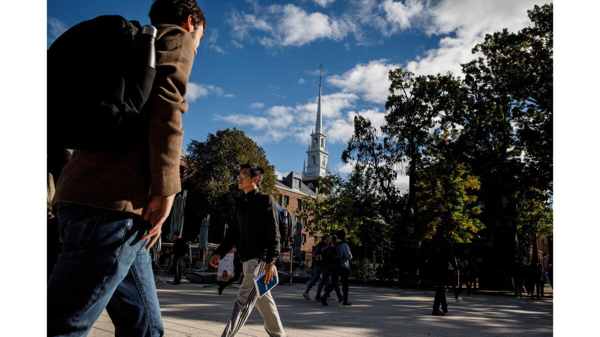 Students at Harvard, where Asian Americans make up 22% of the current freshman class.