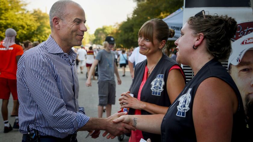 Michael Avenatti shakes hands at the Iowa State Fair in Des Moines on Thursday.