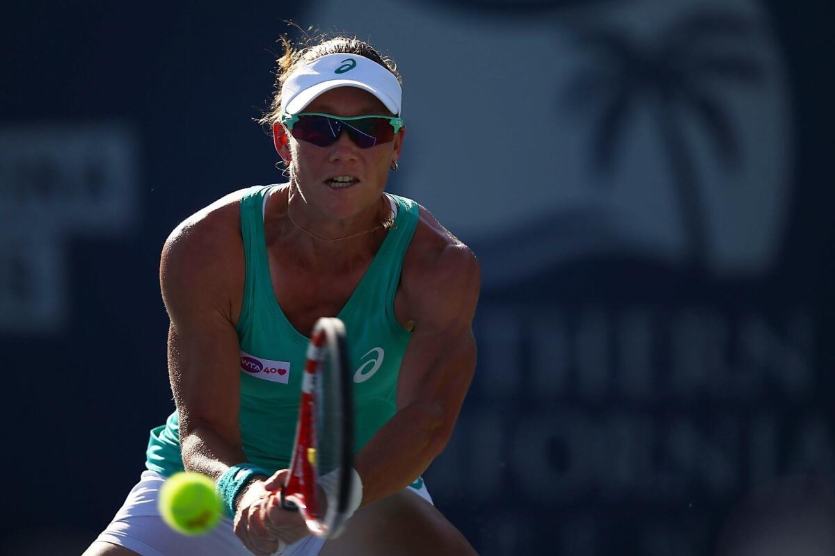 Samantha Stosur hits a backhand during her semifinal victory over Agnieszka Radwanska at the Southern California Open on Saturday.
