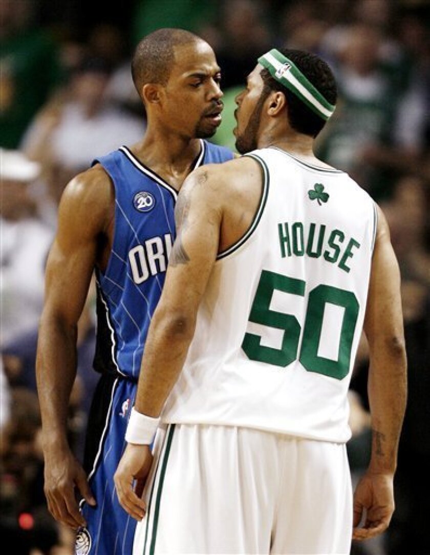 Orlando Magic's Rafer Alston has words with Boston Celtics' Eddie House during the second half of Boston's 112-94 win in Game 2 of an NBA basketball Eastern Conference semifinal series in Boston on Wednesday, May 6, 2009. (AP Photo/Winslow Townson)