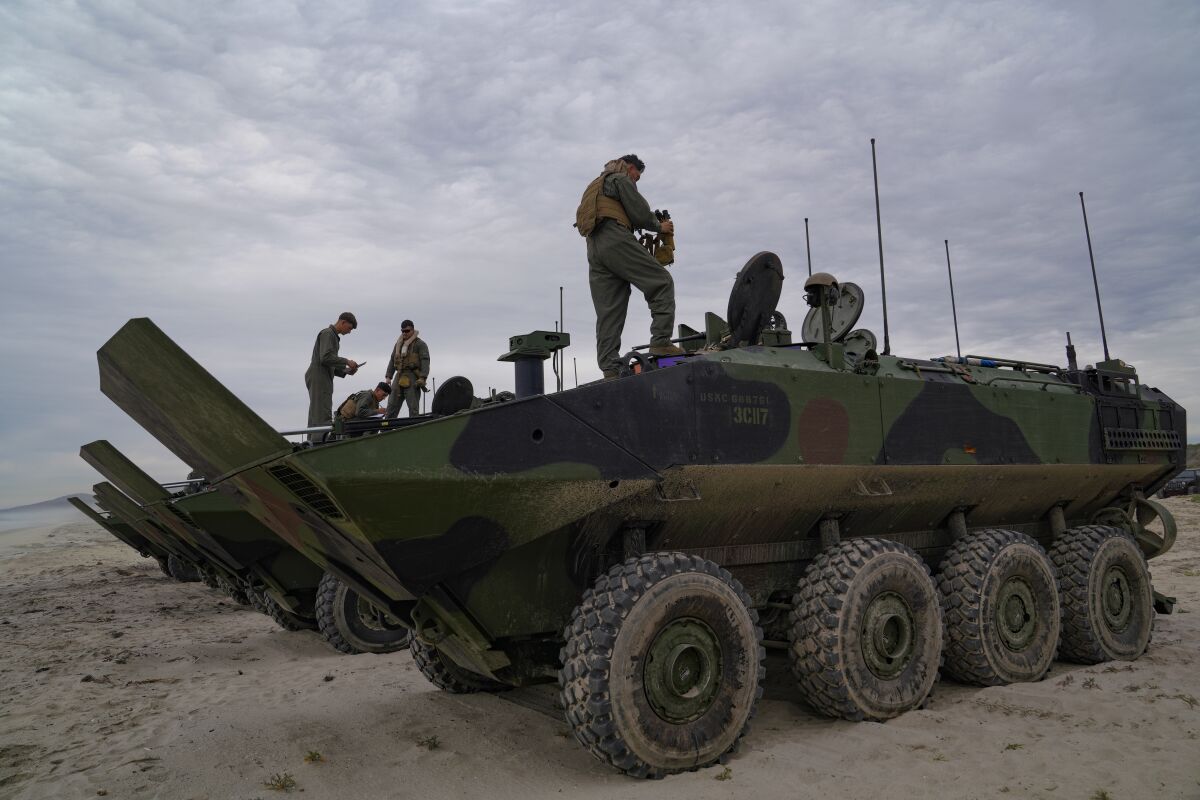 Marines from the 3rd Assault Amphibian Battalion on their Amphibious Combat Vehicle at Camp Pendleton