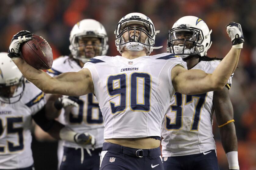 San Diego Chargers linebacker Thomas Keiser (90) reacts after intercepting a pass by Denver Broncos quarterback Peyton Manning. Keiser has been sentenced to probation and anger-management counseling because of a bar fight.