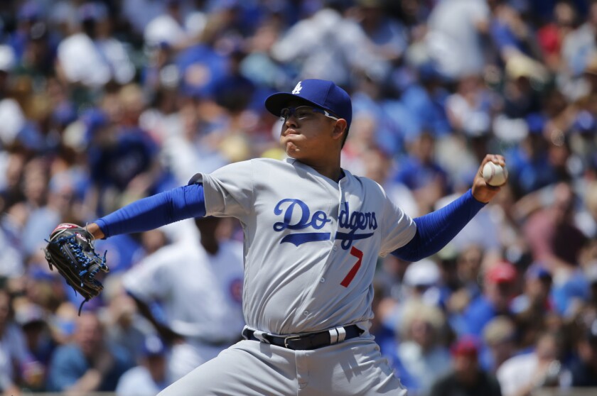 Julio Urias pitches against the Cubs on Thursday.