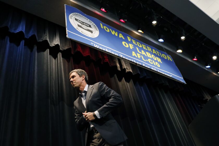 Democratic presidential candidate former Texas Rep. Beto O'Rourke walks off stage after speaking at the Iowa Federation of Labor convention, Wednesday, Aug. 21, 2019, in Altoona, Iowa. (AP Photo/Charlie Neibergall)