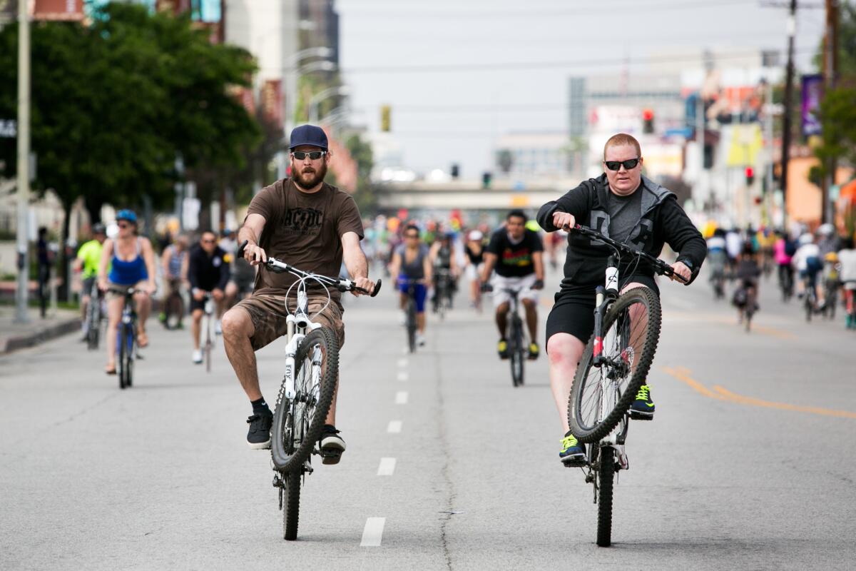 Cyclists ride down Lankershim Boulevard for the CicLAvia festival in Studio City on March 22.