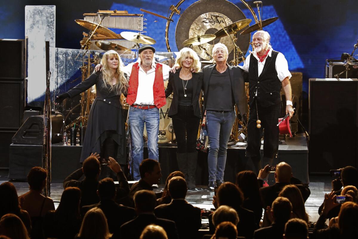 Fleetwood Mac members take their bows at the 2018 MusiCares tribute honoring the band.