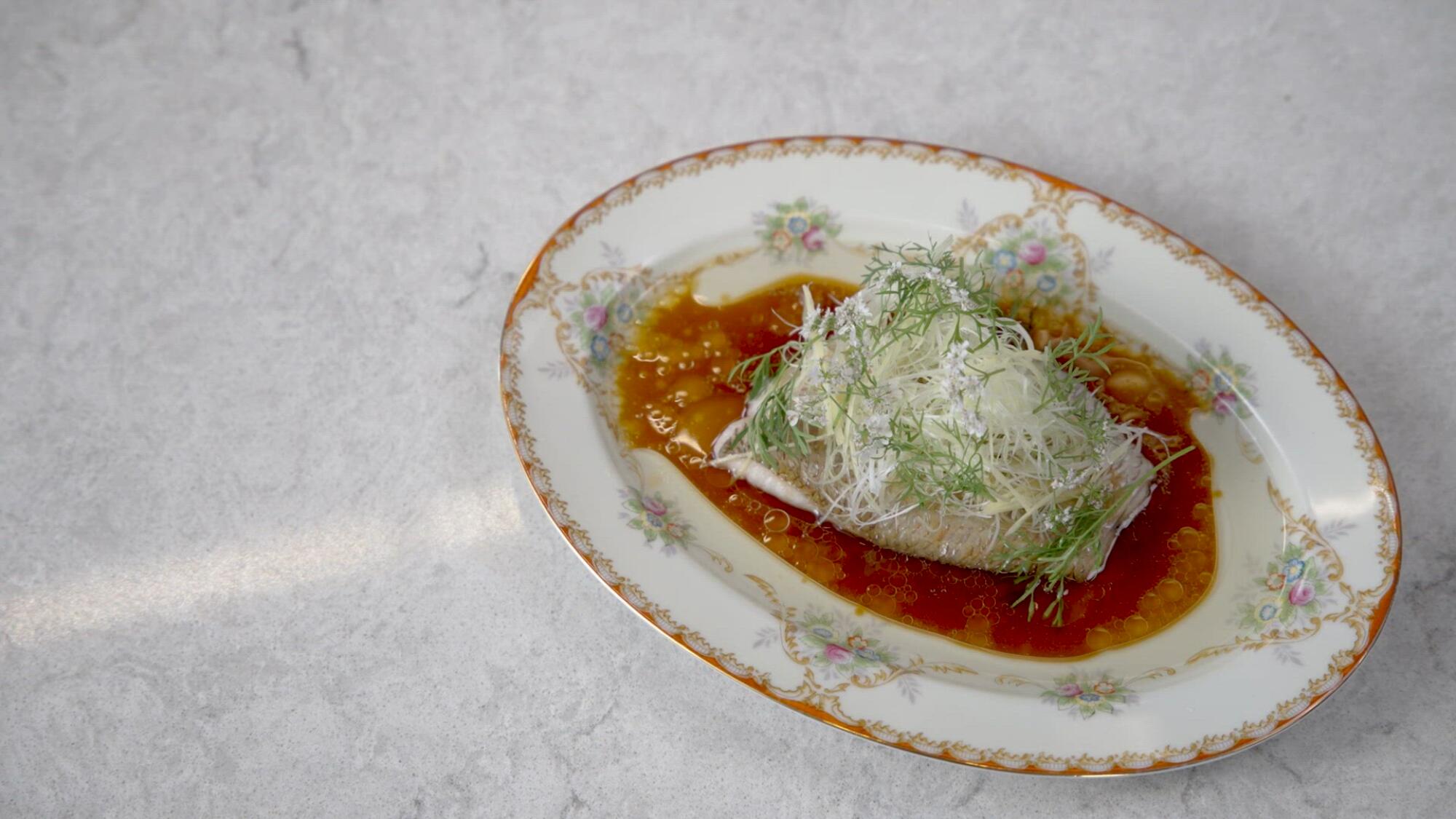Steamed blackthroat sea pearch with Tokyo nego at the L.A. Times test kitchen. 