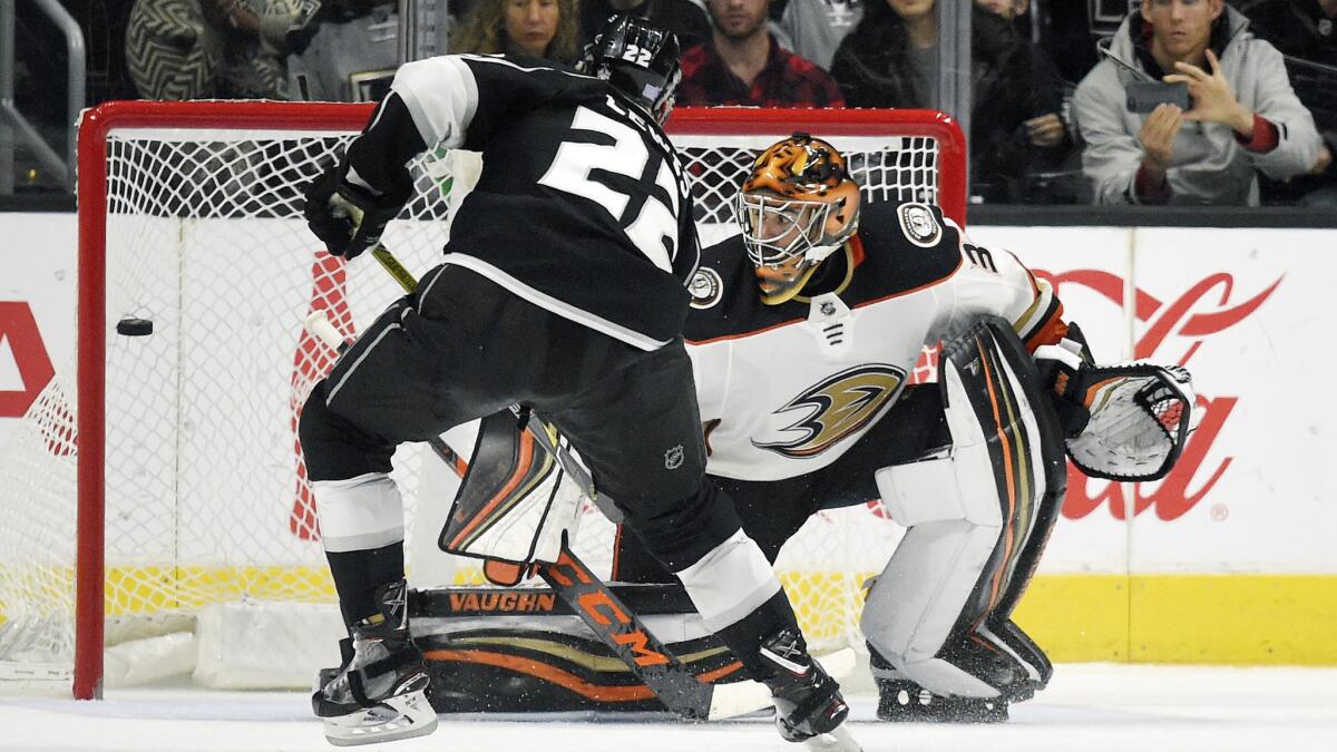 Kings center Trevor Lewis scores the game-winning goal in a shootout against Ducks goalie Ryan Miller on Saturday night.