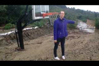 Azusa woman can stand next to basketball hoop after mudslides