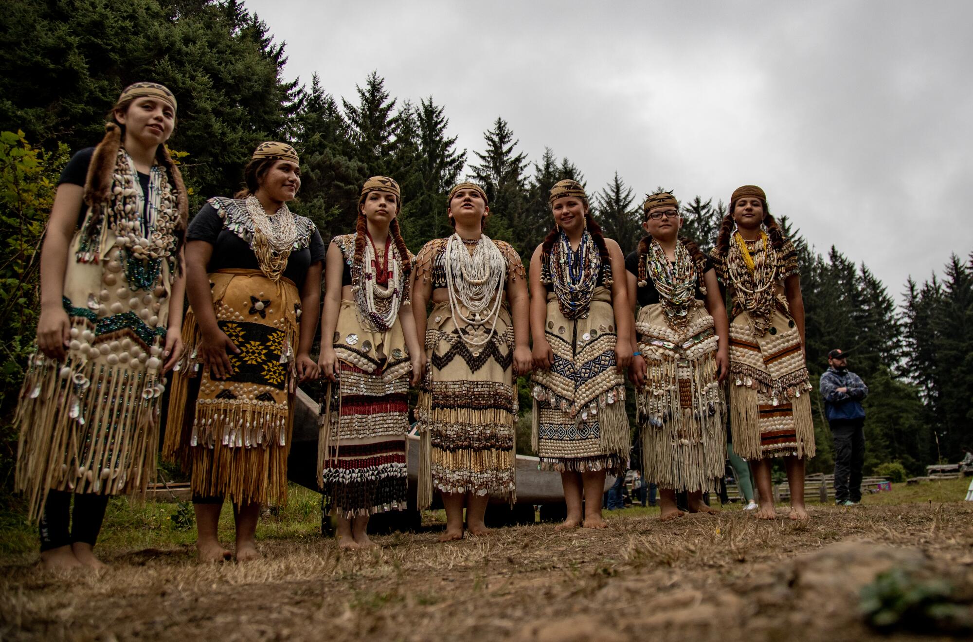 Young Native American girls dressed in brush dance regalia