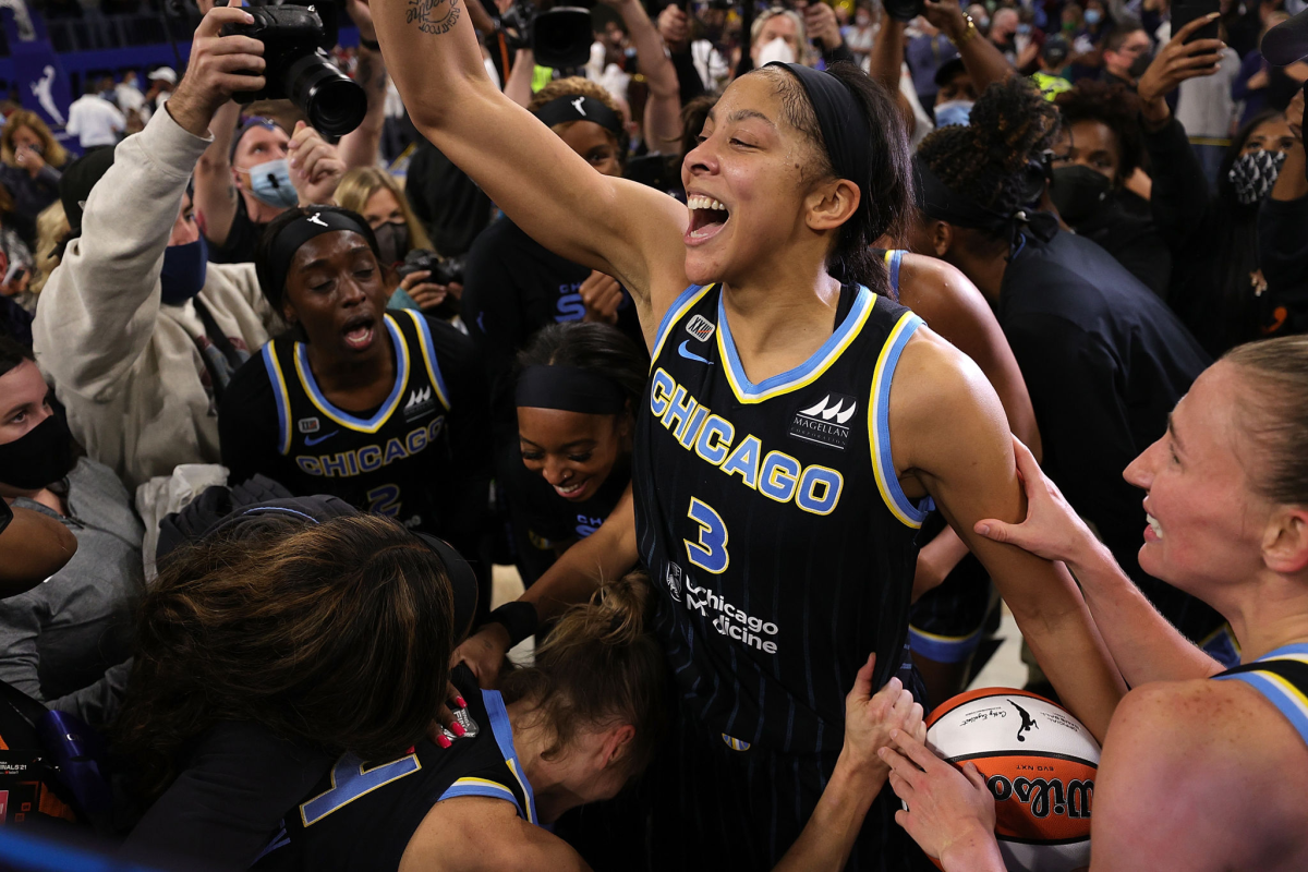Candace Parker celebrates with Chicago Sky teammates in 2021.