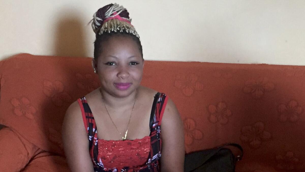 Jennifer Oyakhilome, 18, traveled alone from Nigeria and has been in Catania for over a year. She lives in a reception center for immigrant women.