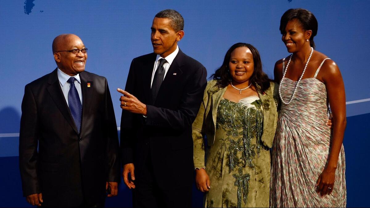 President Obama and former First Lady Michelle Obama, with South African President Jacob Zuma and Nompumelelo Ntuli-Zuma, one of his wives, at the G-20 summit in Pittsburgh in 2009. After he fell ill in 2014, Zuma accused his wife of taking part in a plot to poison him. (Win McNamee / Getty Images)