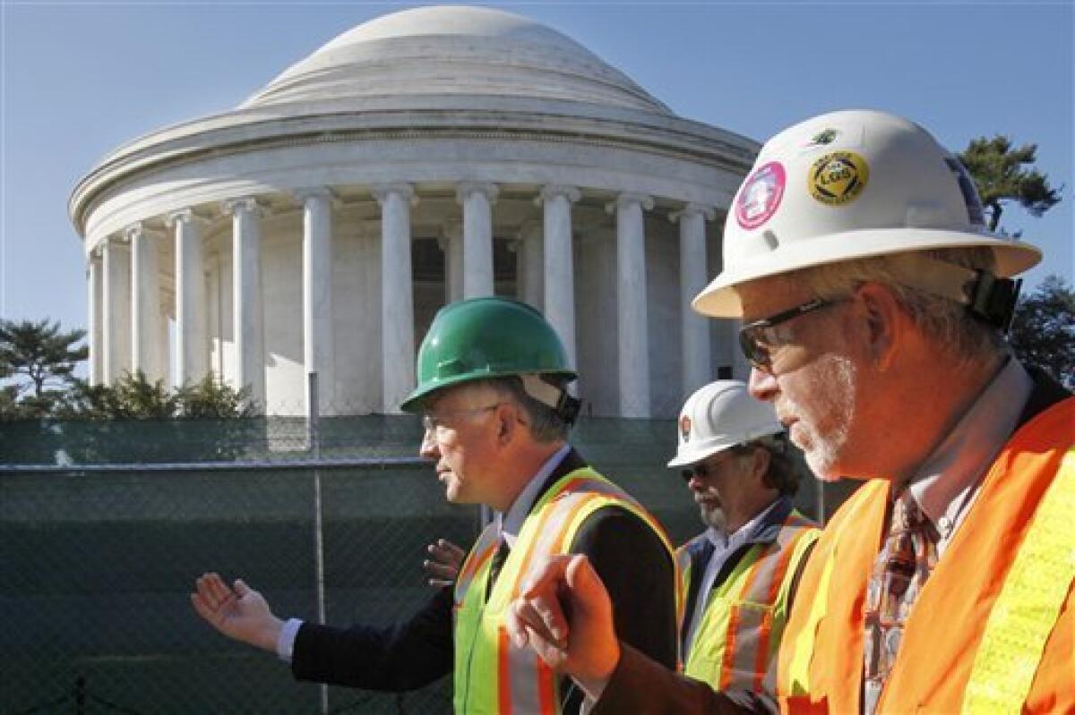 Interior Secretary Ken Salazar, left, tours restoration work at the Thomas Jefferson Memorial with Kevin Waldron, and Phil Sheridan, in Washington, Tuesday, Nov. 9, 2010. (AP Photo/Jacquelyn Martin)
