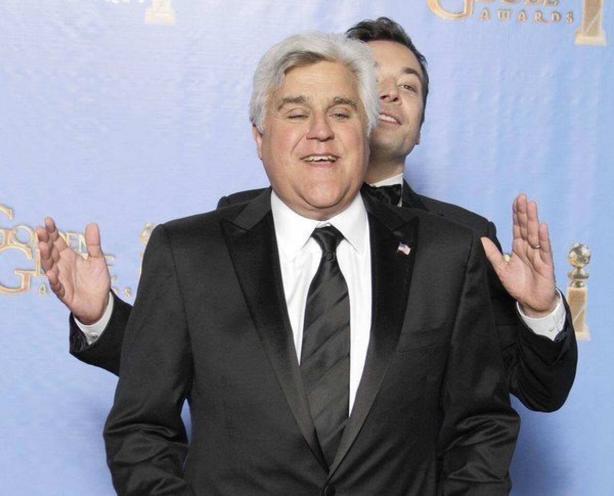Jay Leno has Jimmy Fallon behind him here, but the younger host may take his place next year on “The Tonight Show.”