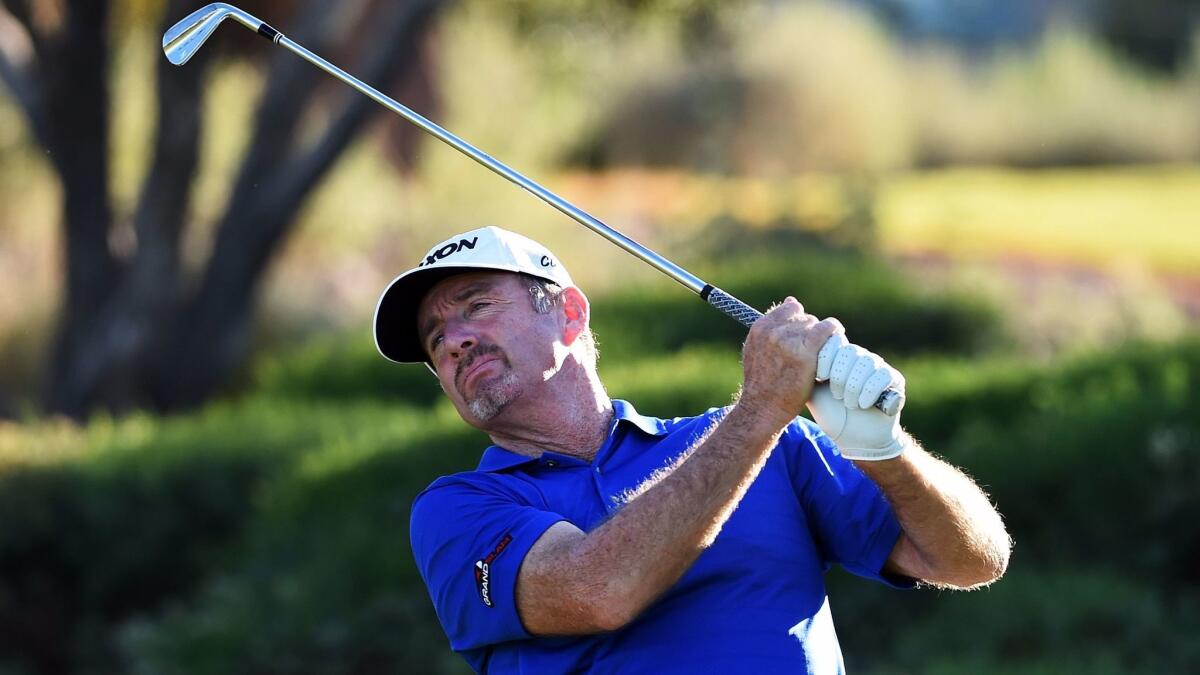 Rod Pampling watches his tee shot at No. 8 during the second round of the Shriners Hospitals for Children Open on Friday.