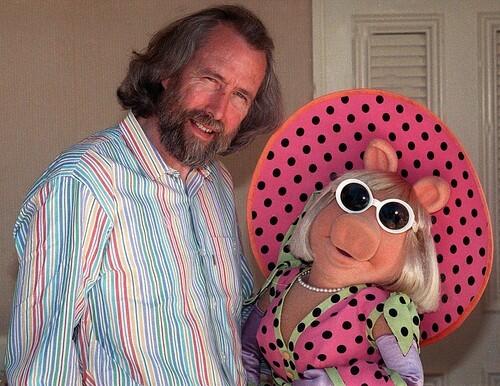 Miss Piggy and companion Jim Henson take a break from reporters in May 1989 in Los Angeles to talk about "The Jim Henson Hour," a magazine-style show aired by NBC.
