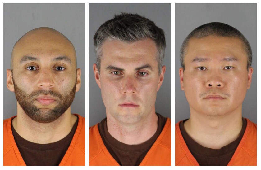 FILE - This combination of photos provided by the Hennepin County Sheriff's Office in Minnesota on Wednesday, June 3, 2020, shows from left, former Minneapolis police Officers J. Alexander Kueng, Thomas Lane and Tou Thao. A more detailed trial schedule for three former Minneapolis police officers charged with aiding and abetting in the death of George Floyd has been set for next March, according to an order made public Wednesday, June 9, 2021. Last month, a judge pushed the trial of Lane, Kueng and Thao out to next March, in part because he wanted publicity from the trial of ex-officer Derek Chauvin to cool down, and partly to allow a federal case against the officers to go forward first. (Hennepin County Sheriff's Office via AP File)
