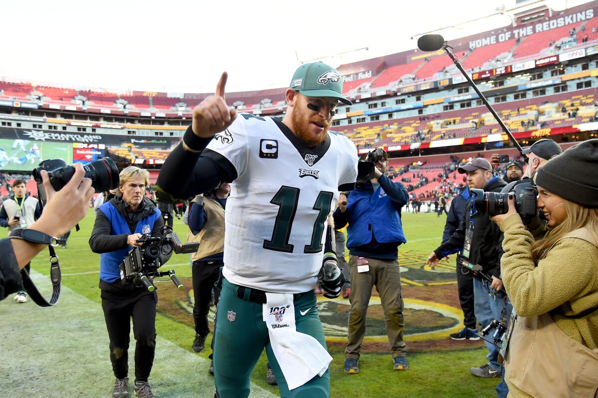 Philadelphia quarterback Carson Wentz celebrates the Eagles' win over the Washington Redskins on Sunday.